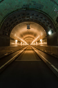 Illuminated railroad station at night