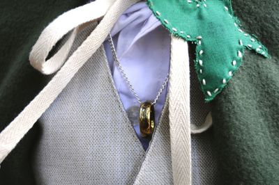 Close-up of suit and necklace