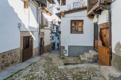 Street amidst buildings in town