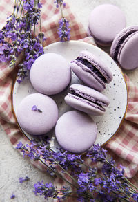 French macarons with lavender flavor and fresh lavender flowers