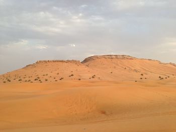 Scenic view of desert against sky