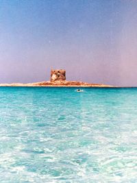 Scenic view of sea in front of blue sky