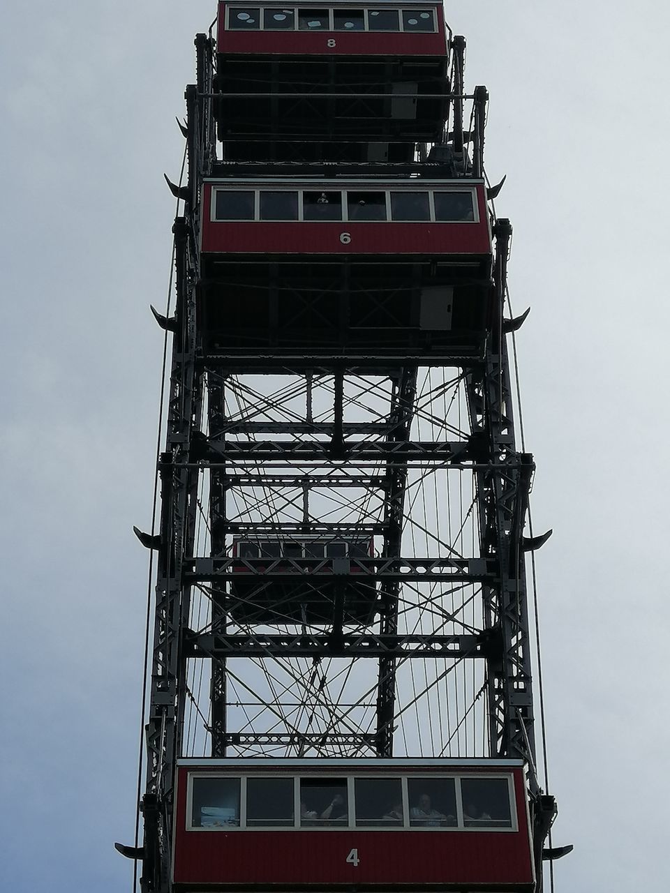 LOW ANGLE VIEW OF RED TOWER AGAINST SKY