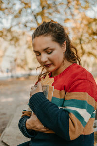 Portrait of smiling young woman