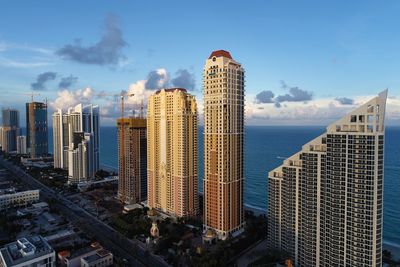 Panoramic view of modern buildings against sky