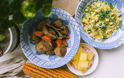 High angle view of breakfast served on table