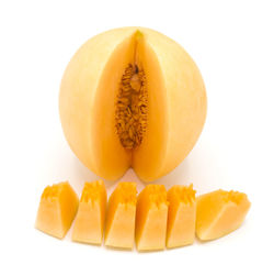 Close-up of orange fruit against white background