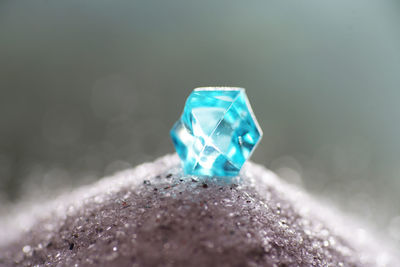Macro shot of blue paint on stone