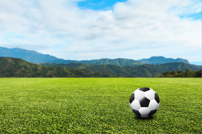Scenic view of soccer field against sky