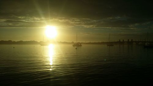 Scenic view of sunset over river