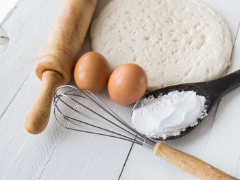 High angle view of eggs in container on table