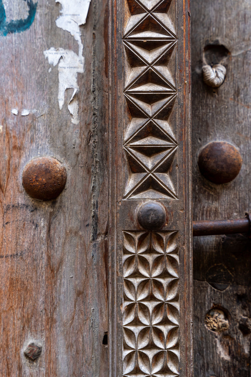 door, entrance, iron, wood, closed, metal, no people, pattern, security, full frame, protection, close-up, old, backgrounds, wall, day, knob, doorknob, textured, architecture, lock, rusty, door handle, weathered, door knocker, built structure, ancient history, outdoors, brown, shape, front door, handle