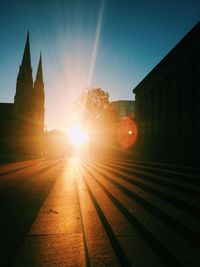 Sun shining over city