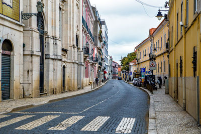 Street amidst buildings in city