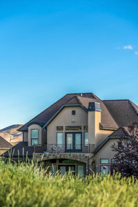 Houses against clear blue sky