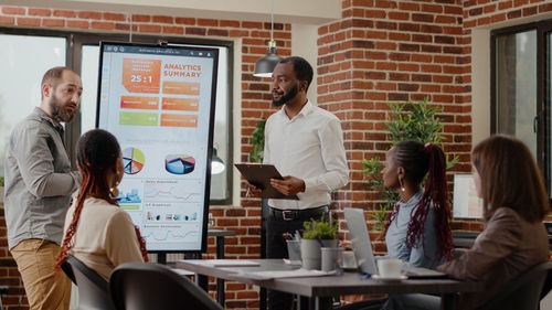 Business colleagues working in office