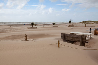 Scenic view of beach against sky