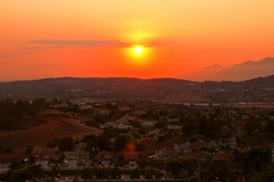 Scenic view of landscape against sky during sunset