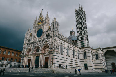 Facade of temple against sky