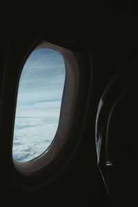 View of sea through airplane window