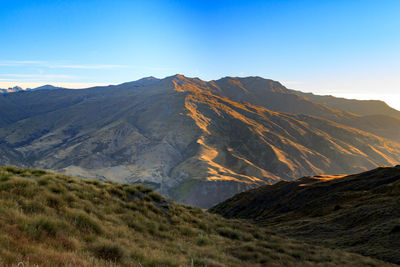 Scenic view of mountains against clear sky