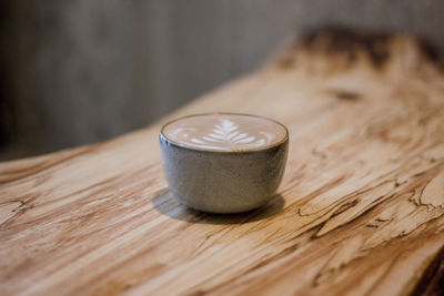 High angle view of coffee cup on table