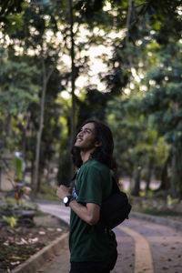 Side view of a young woman looking away
