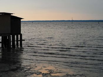 Scenic view of sea at sunset