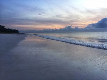 Scenic view of sea against sky at sunset