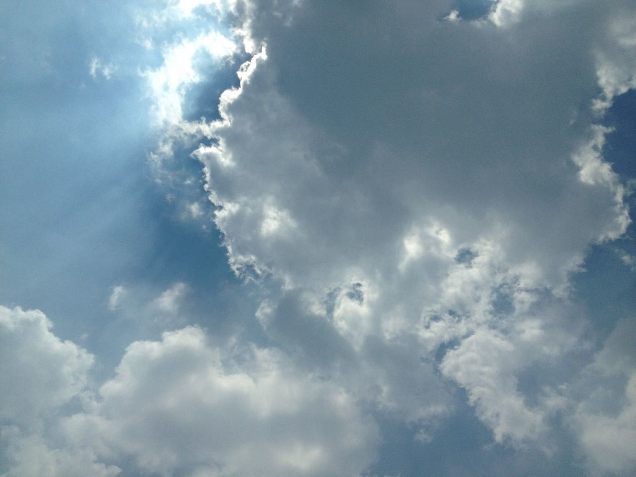 sky, cloud - sky, low angle view, beauty in nature, tranquility, sky only, blue, cloudy, scenics, nature, cloud, tranquil scene, backgrounds, cloudscape, full frame, white color, idyllic, day, outdoors, no people