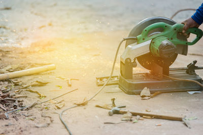 Close-up of hand using grinder