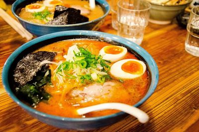 Close-up of soup served on table