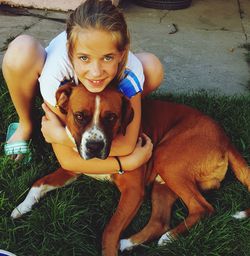 Portrait of cute dog on grass