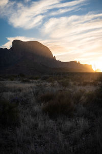 Scenic view of landscape against sky during sunset