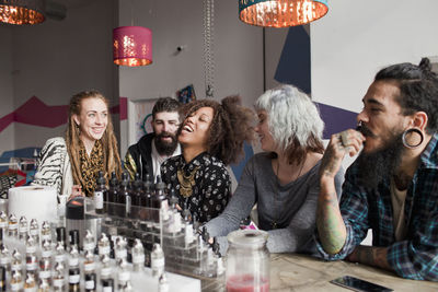 Young friends vaping together