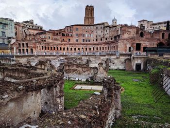 View of old ruin building against cloudy sky