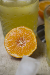 Close-up of orange slice on table