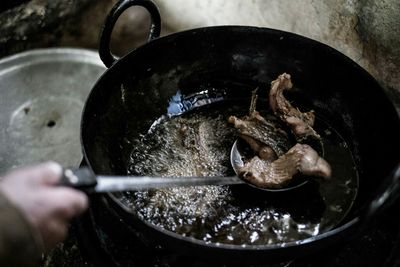 Close-up of person preparing food