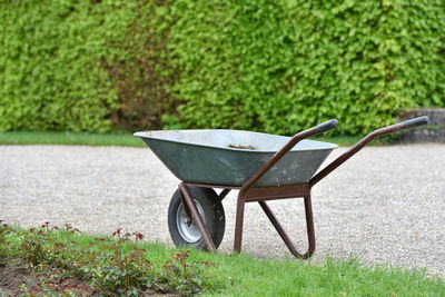 Garden trolley against a hedge  in a garden