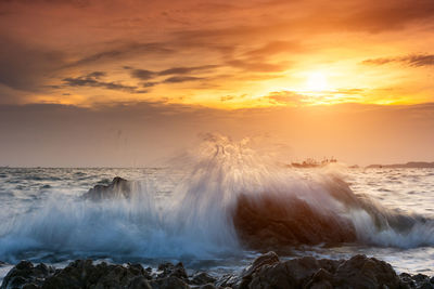 Scenic view of sea against sky during sunset