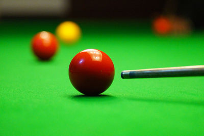 Close-up of pool ball on table