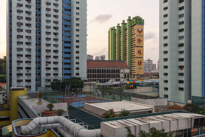 Buildings in city against sky