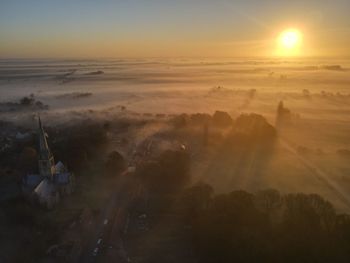 High angle view of landscape against sky during sunset