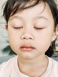 Close-up portrait of cute girl