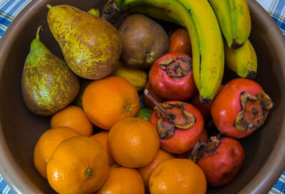 High angle view of oranges in container