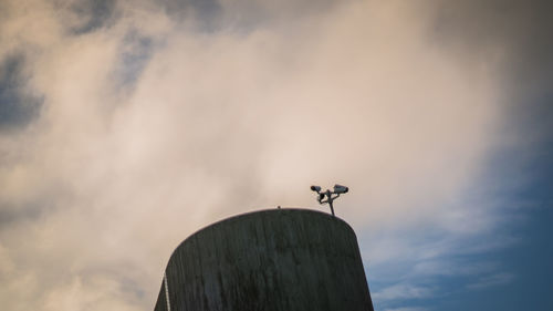 Low angle view of weather vane