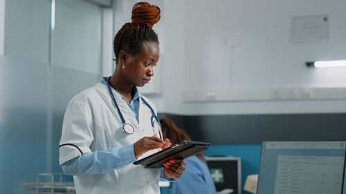 Female doctor working in hospital