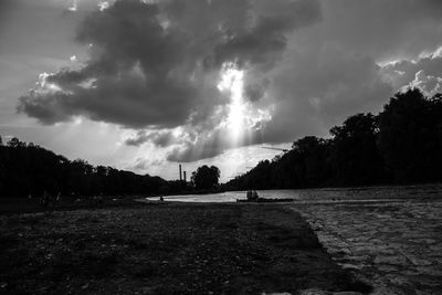 Scenic view of silhouette trees against sky