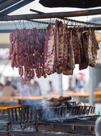 Close-up of meat on barbecue grill