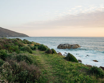 Scenic view of sea against sky during sunset